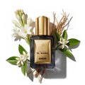 Maison El Nabil Amor - Flacon de parfum avec fleurs blanches et racines