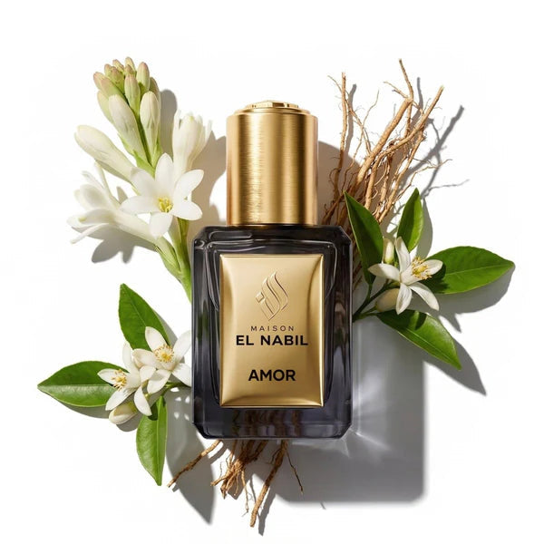 Maison El Nabil Amor - Flacon de parfum avec fleurs blanches et racines